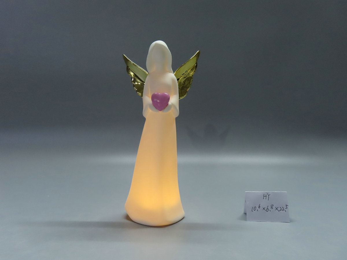 White ceramic angel hold heart with LED light