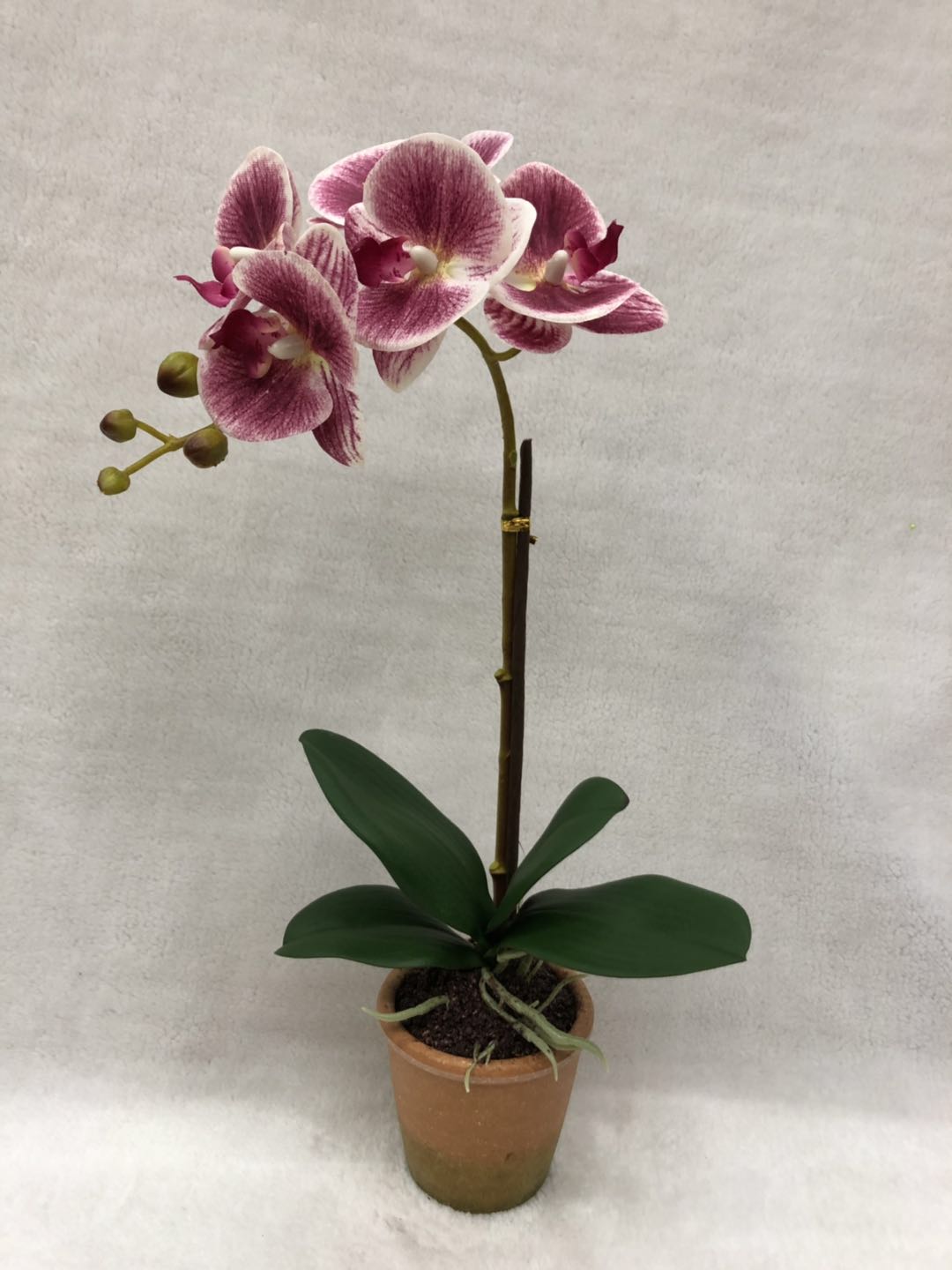 Potted artificial flowers