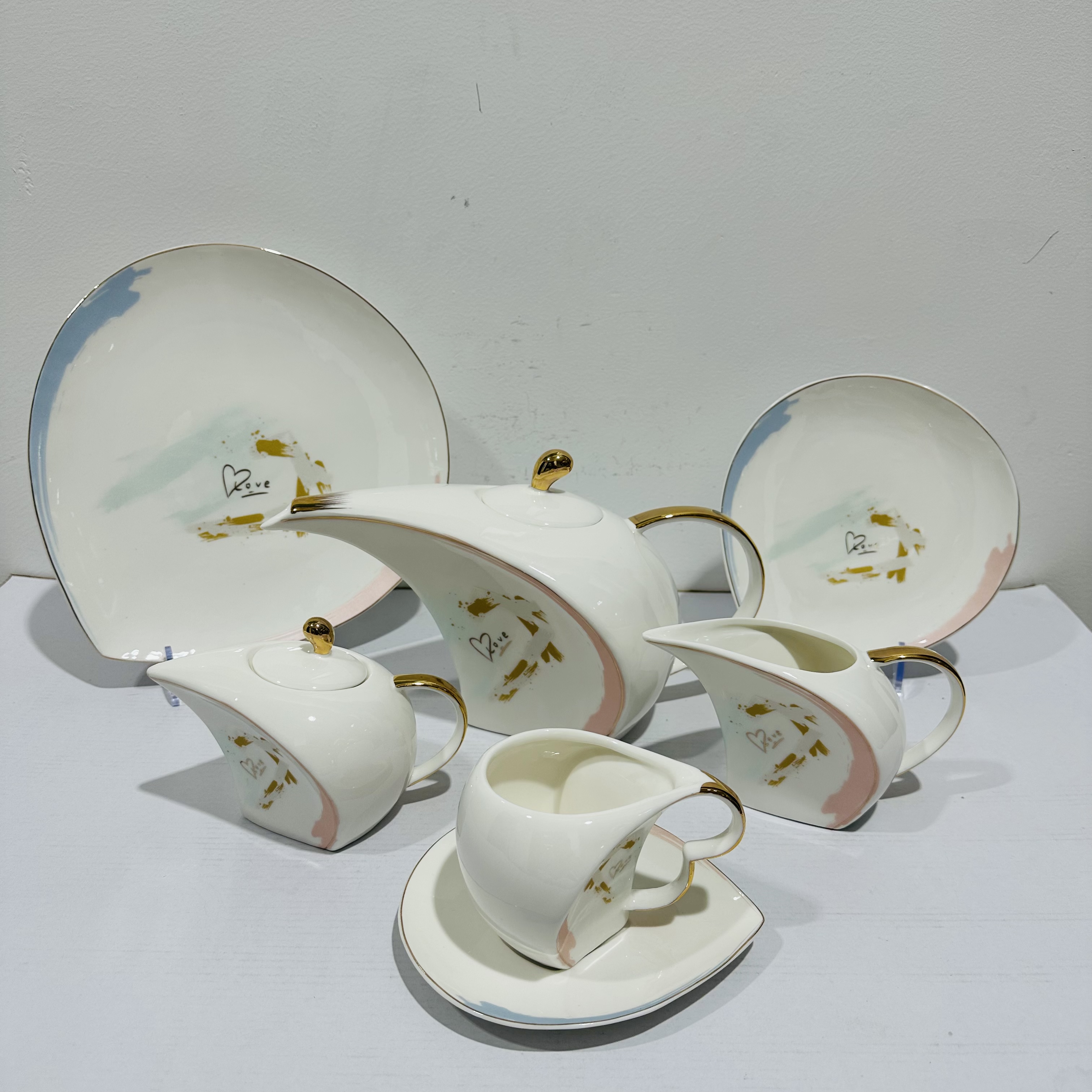 Ivory shaped white ceramic tea set