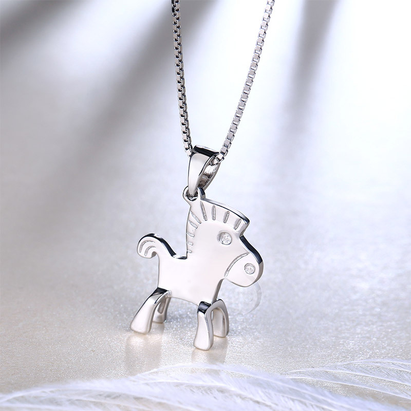 Sterling silver female pony pendant accessorized with all fashion accessories necklace