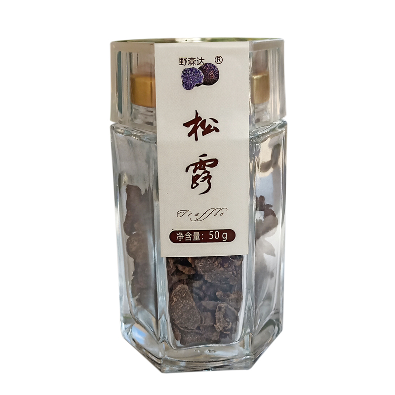 Dried truffle in glass bottles