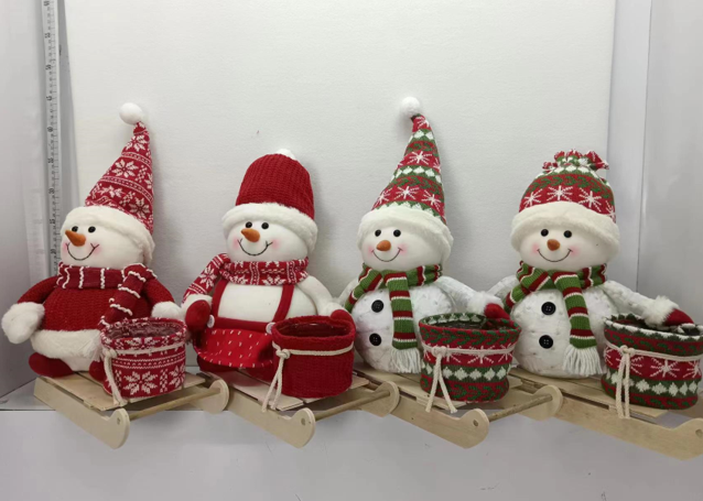 Snowman with a sled