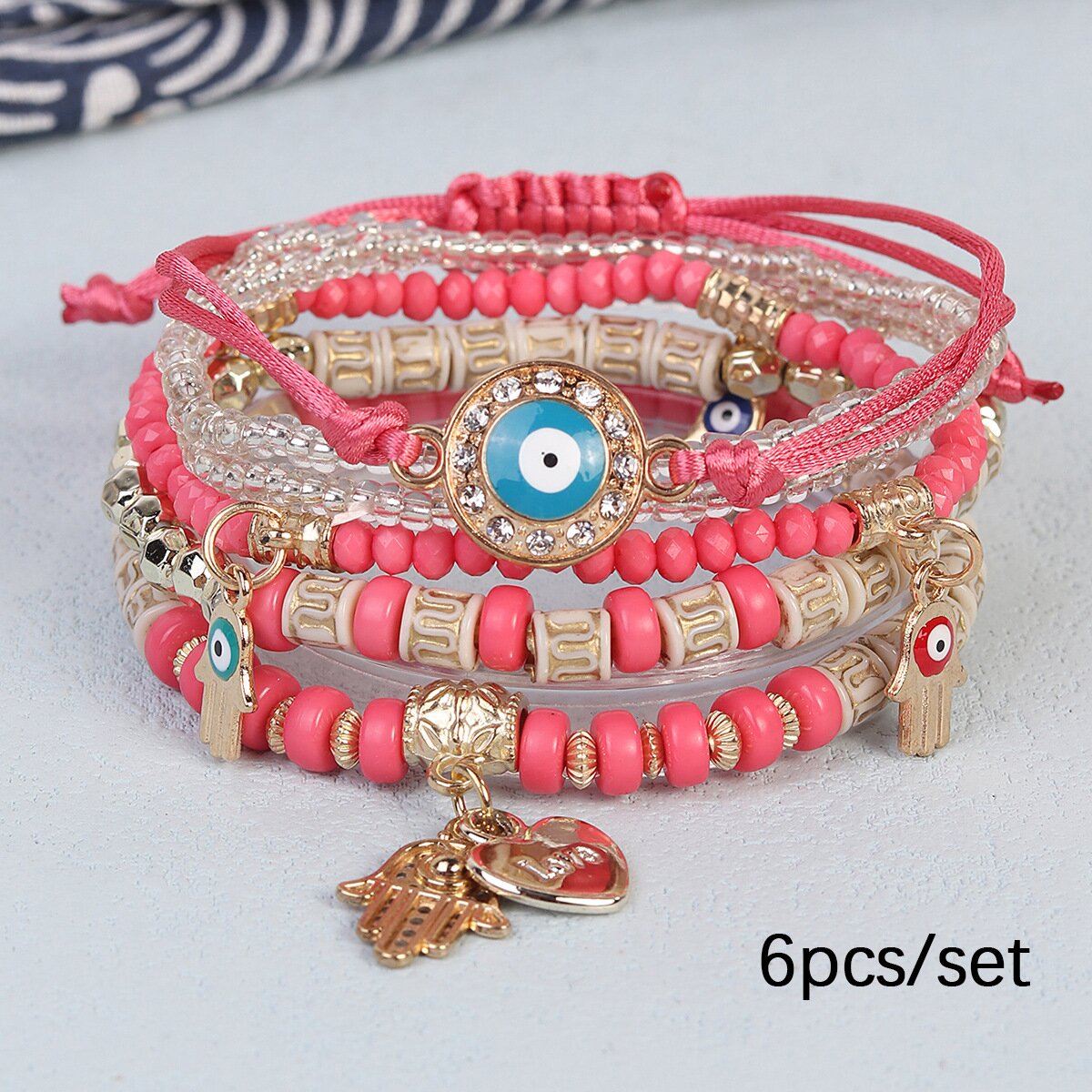 Hand woven hand and eye bracelet