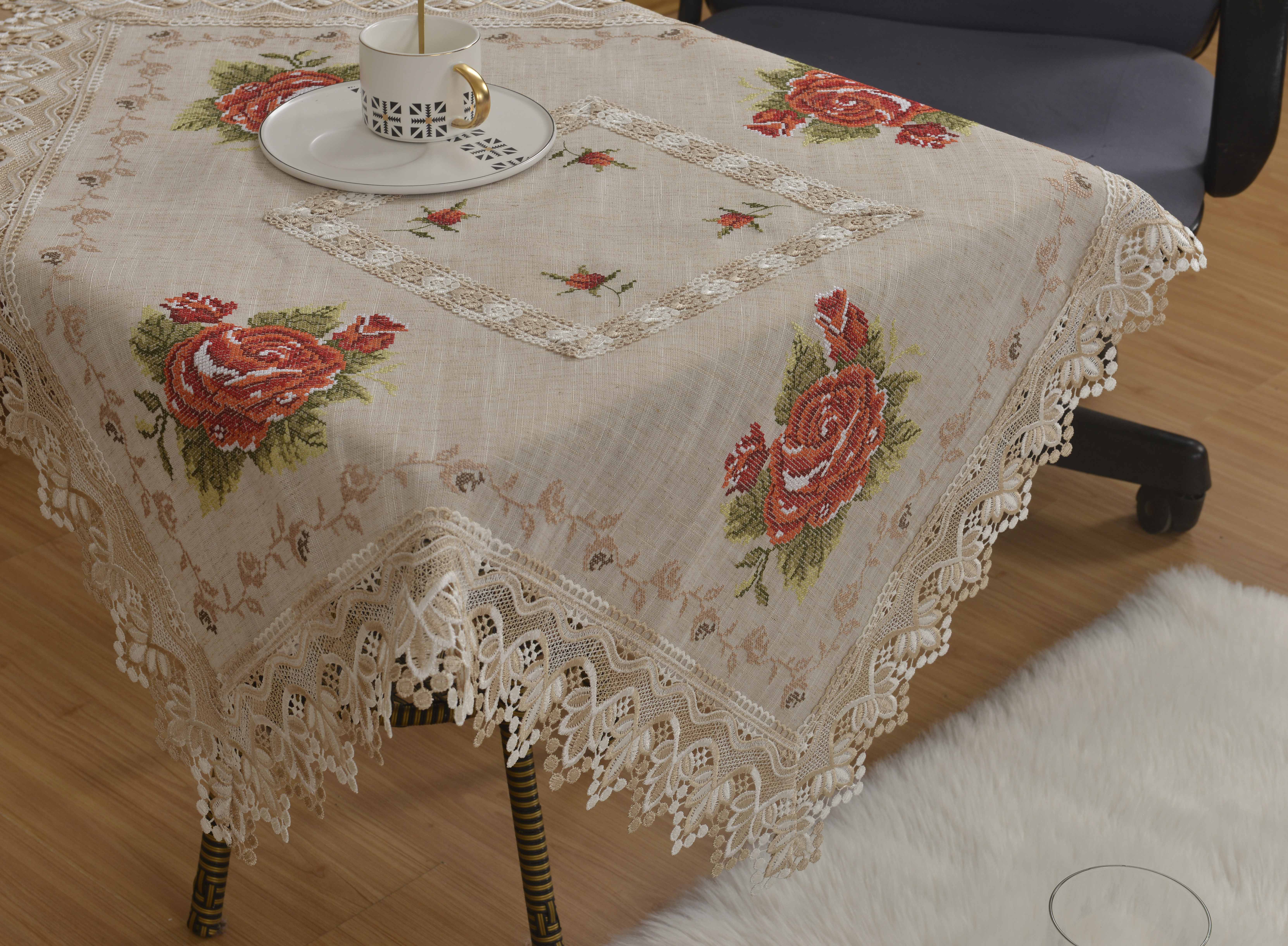 Embroidered tablecloths, placemats