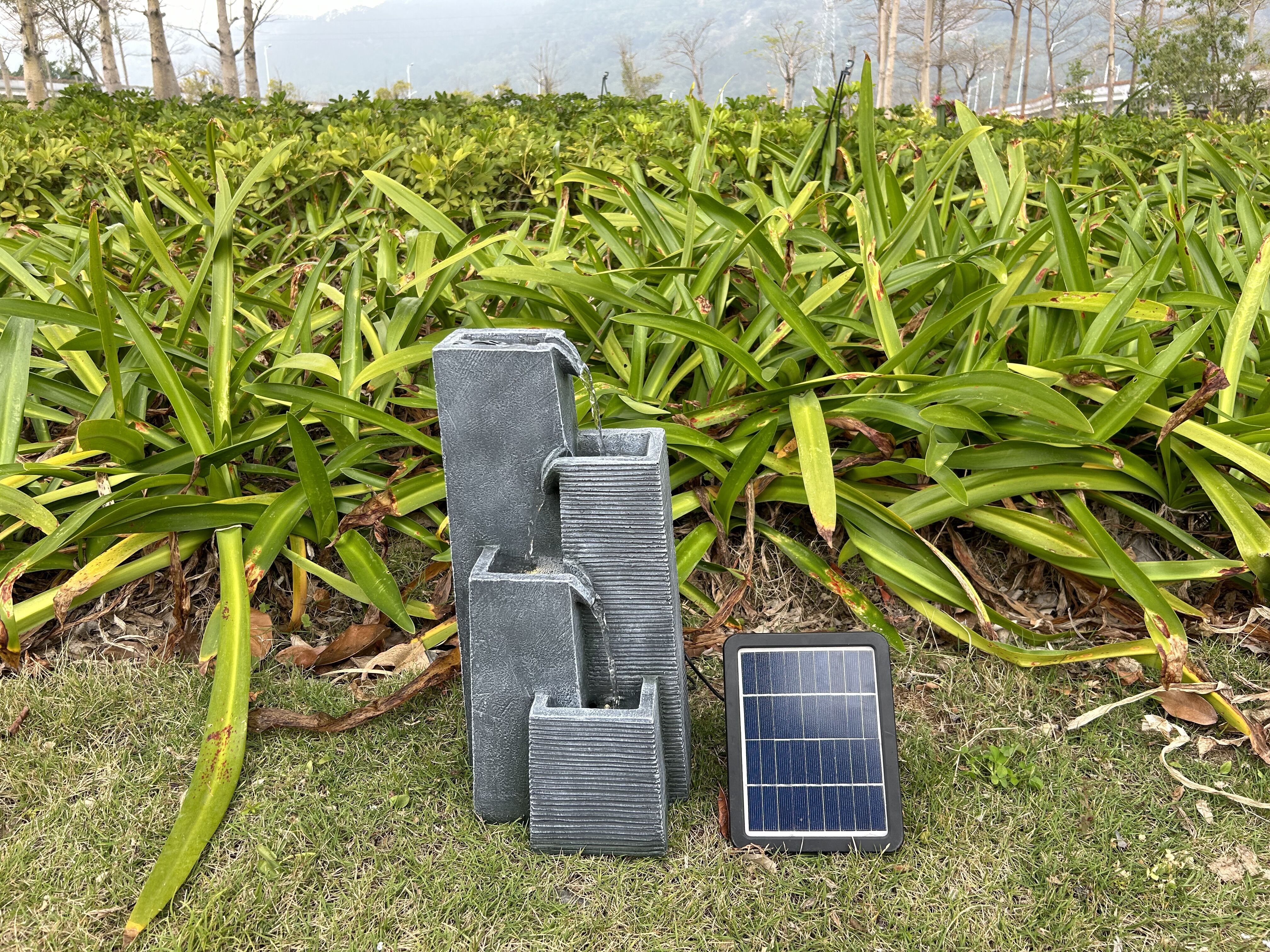 Green energy solar fountain with four layer