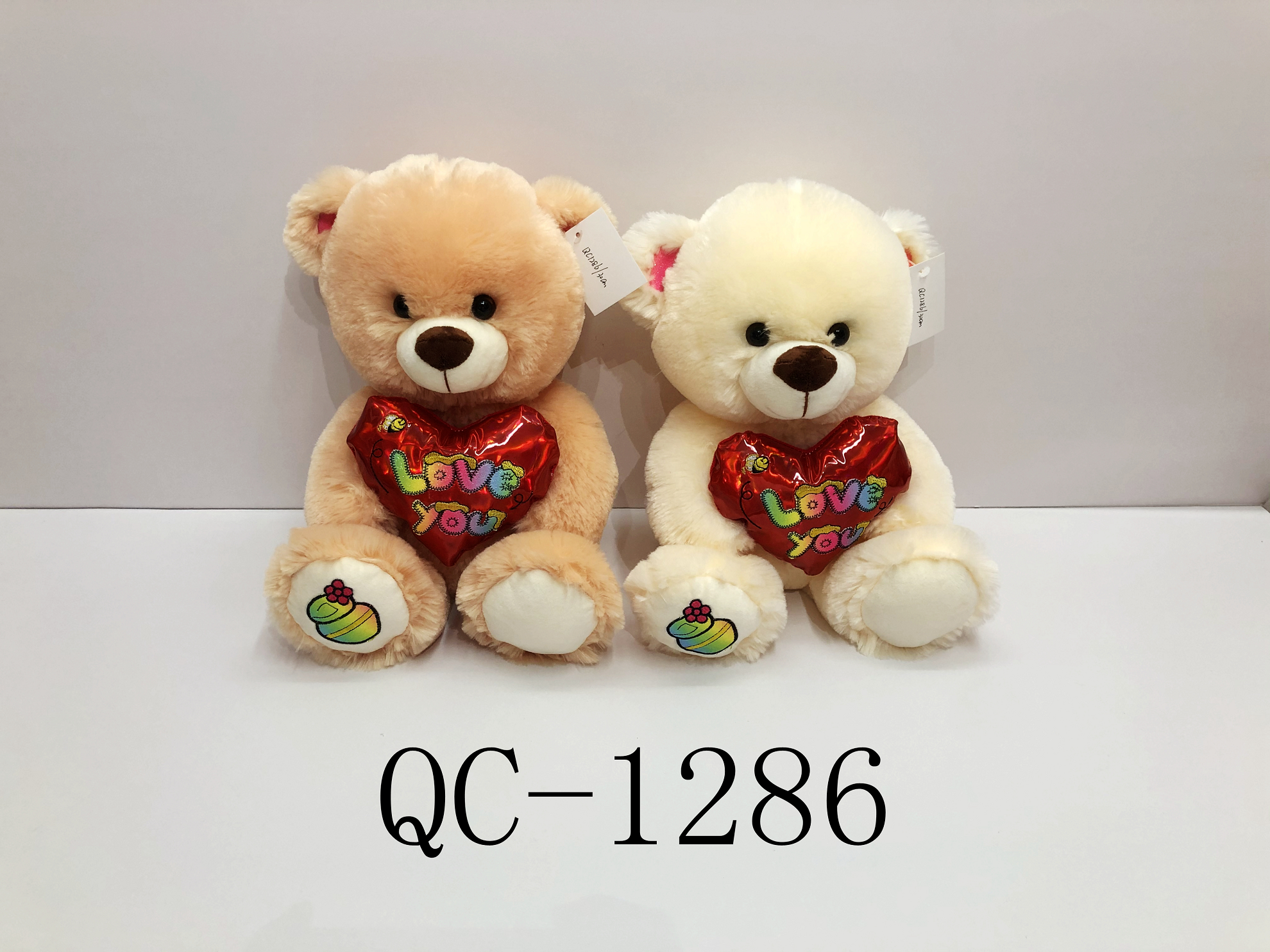 Plush bear with heart