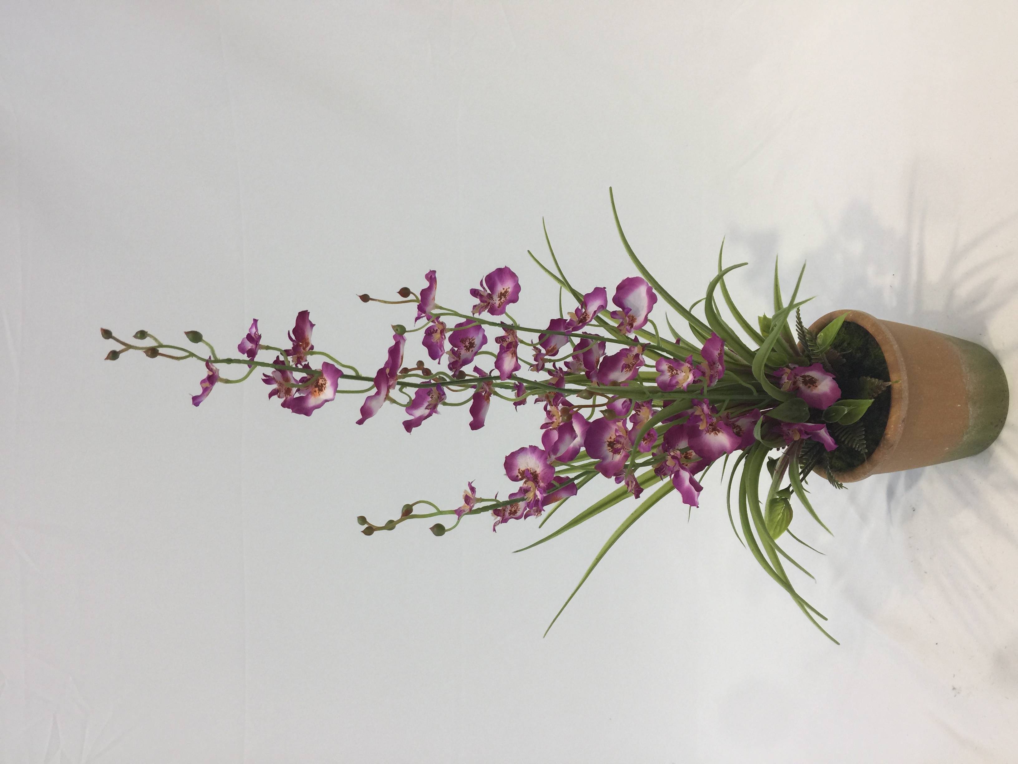Potted artificial flowers