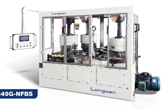Metal can flanger and seaming machine