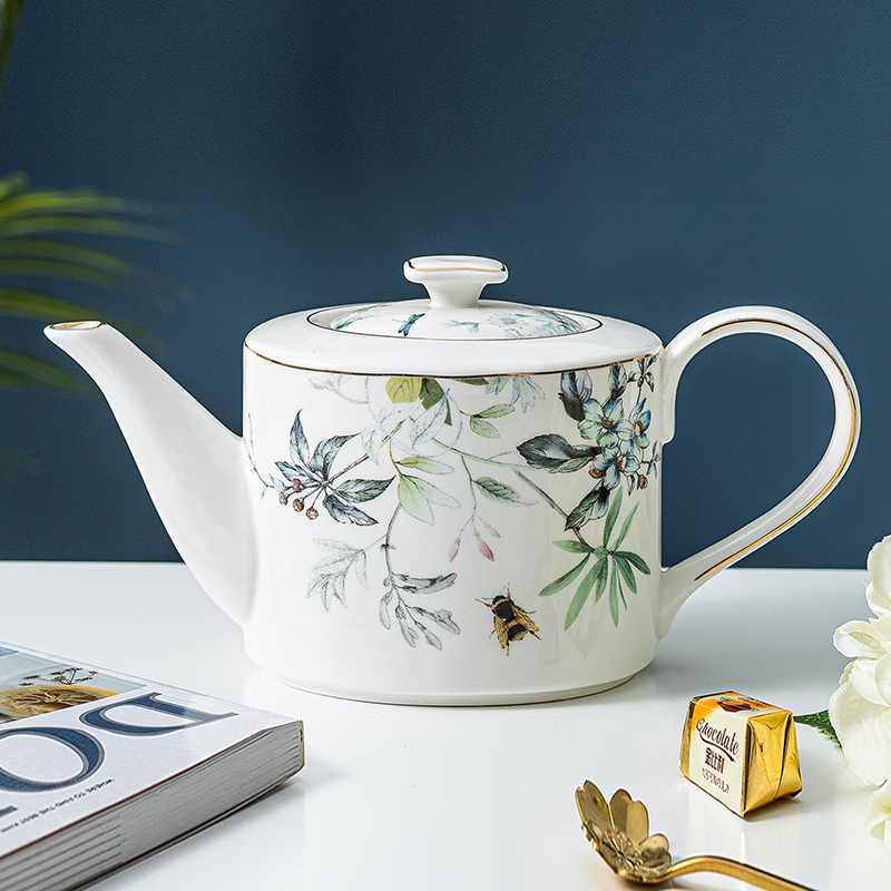 Teapot with flowers and brocade