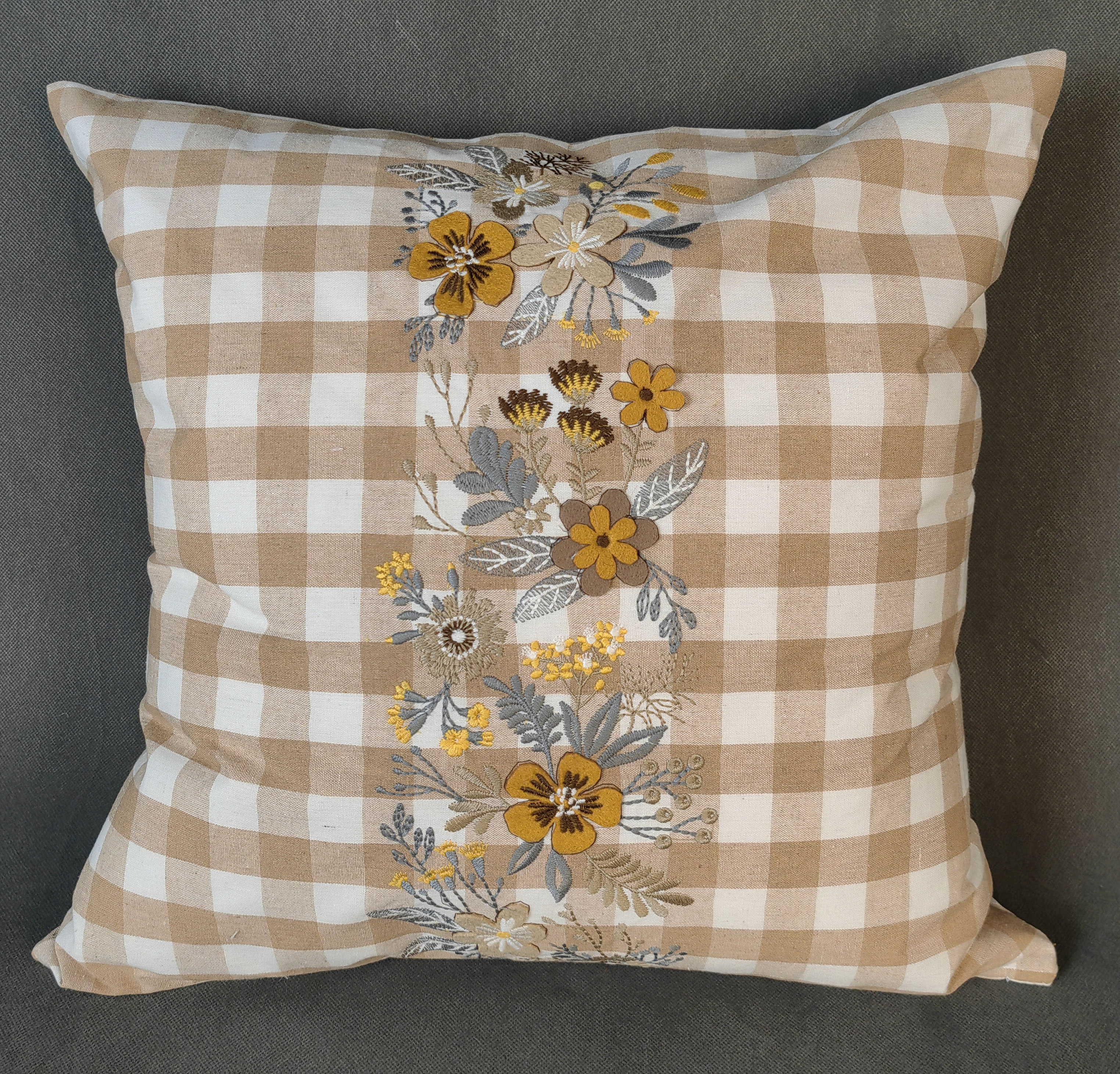 Check fabric with embroidery cushion