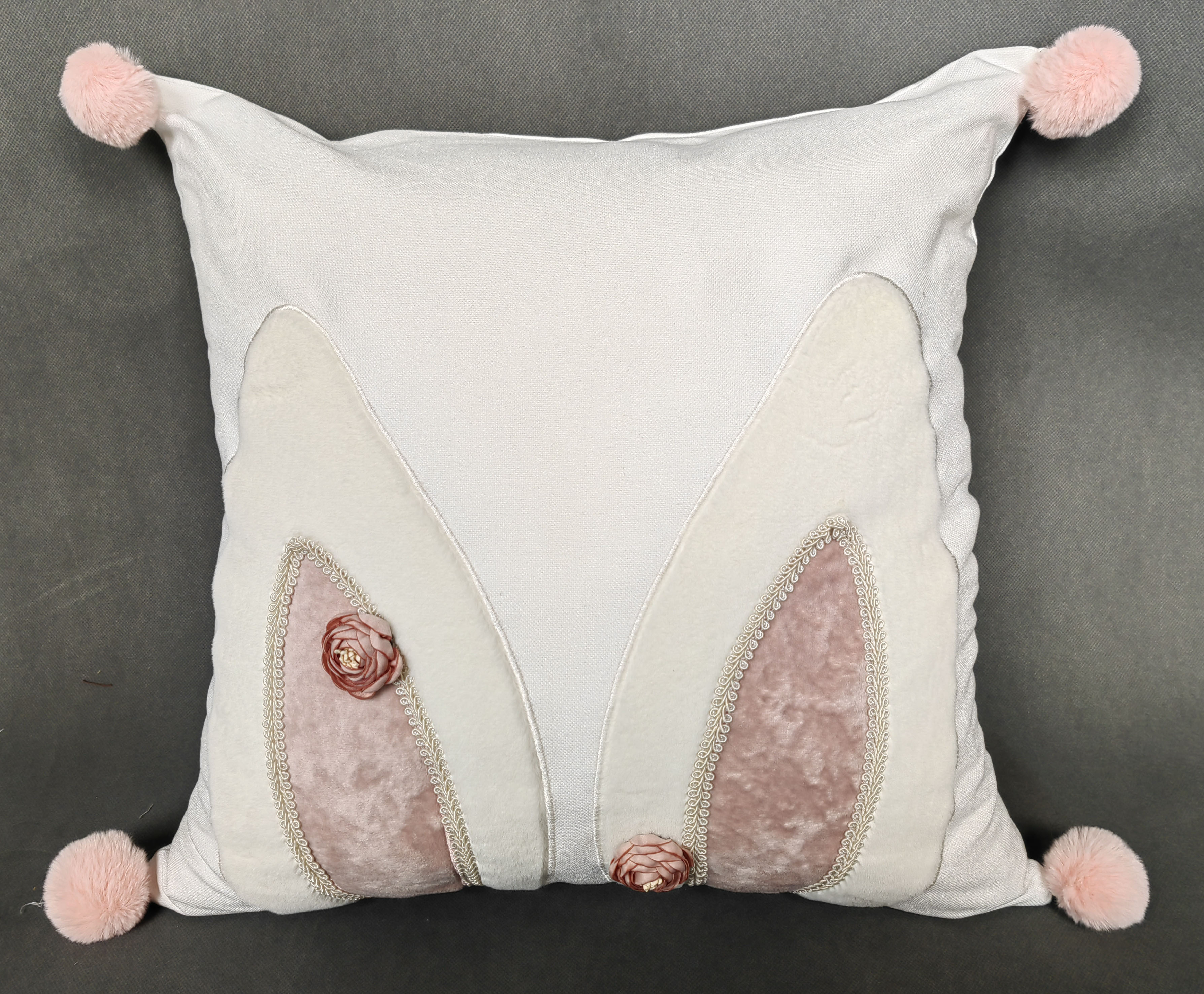 Embroidery cushion with rabbit ear