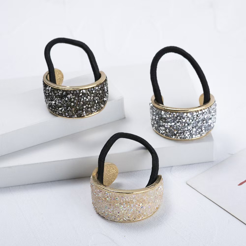 semi-circular diamond studded headband, tied with ponytail and rubber band for women