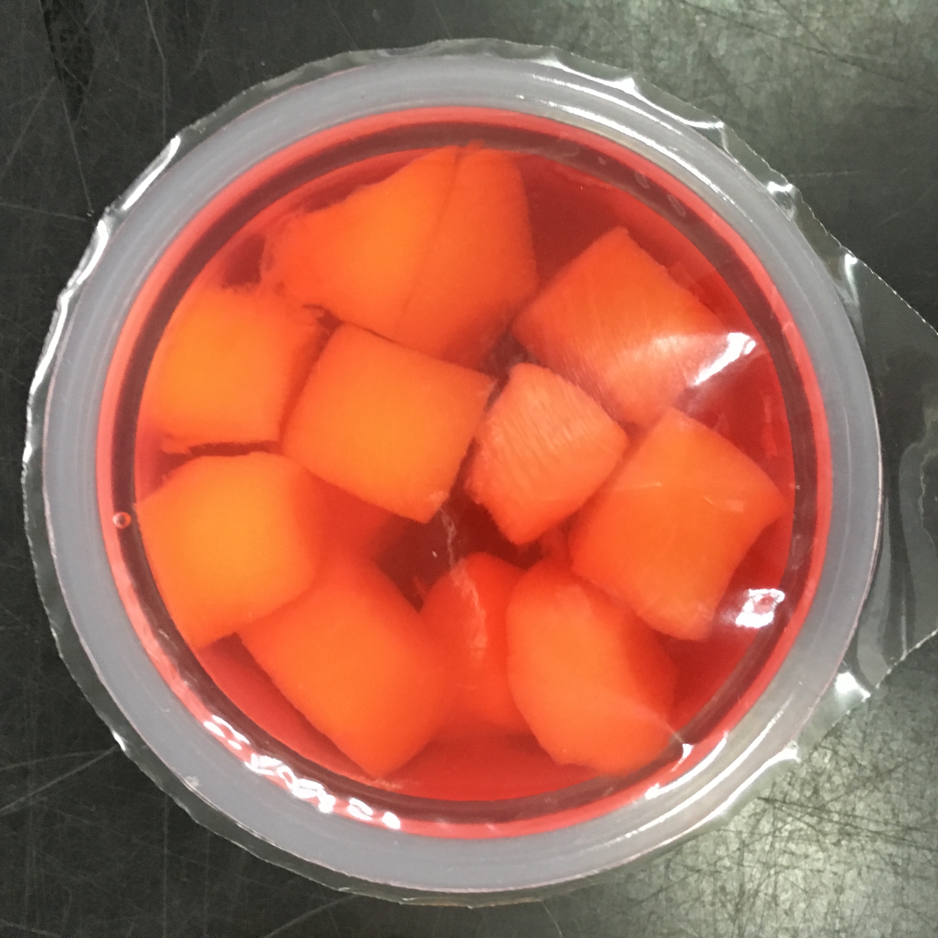 Peach Diced In Strawberry Gel