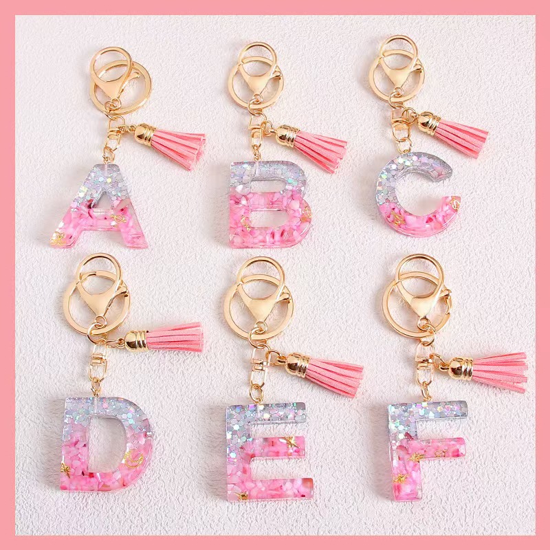Sparkling pink English letter tassel keychain