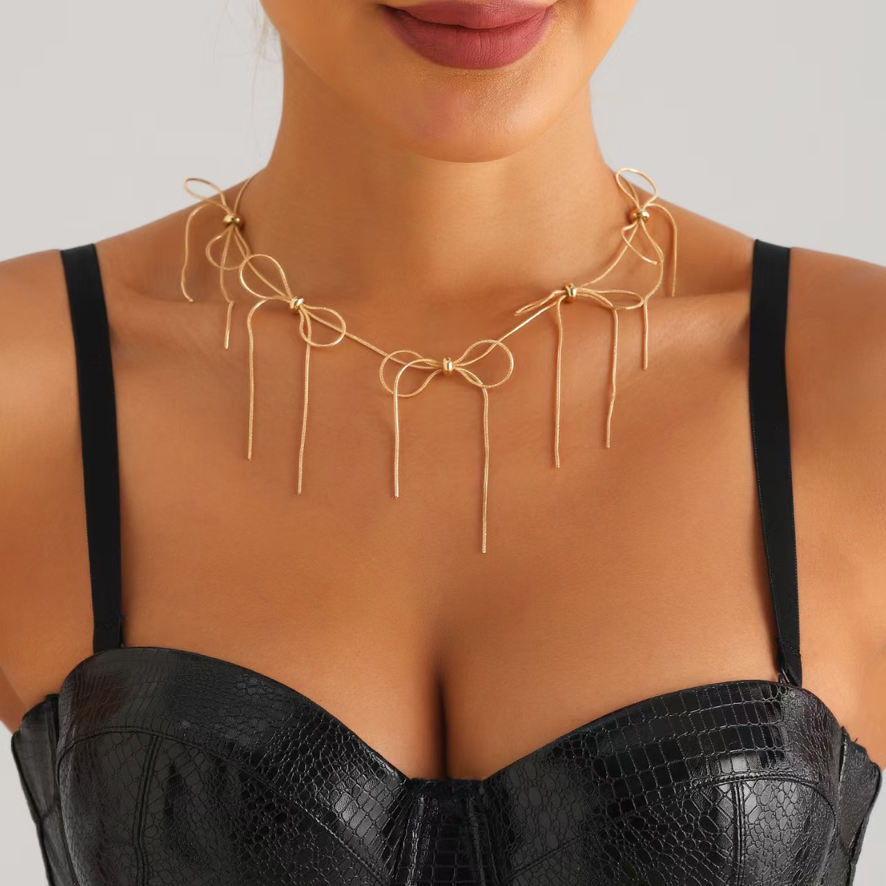 Cross border fashion tassel bow knotted necklace from Europe and America