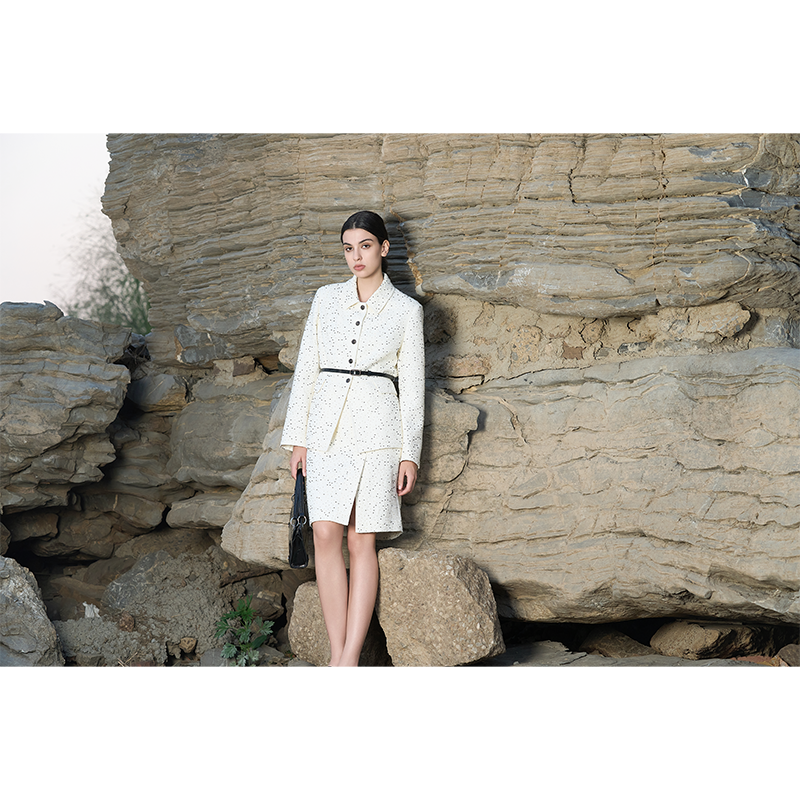 White beaded tweed suit