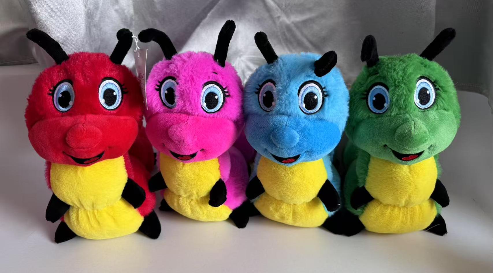 Plush caterpillar doll