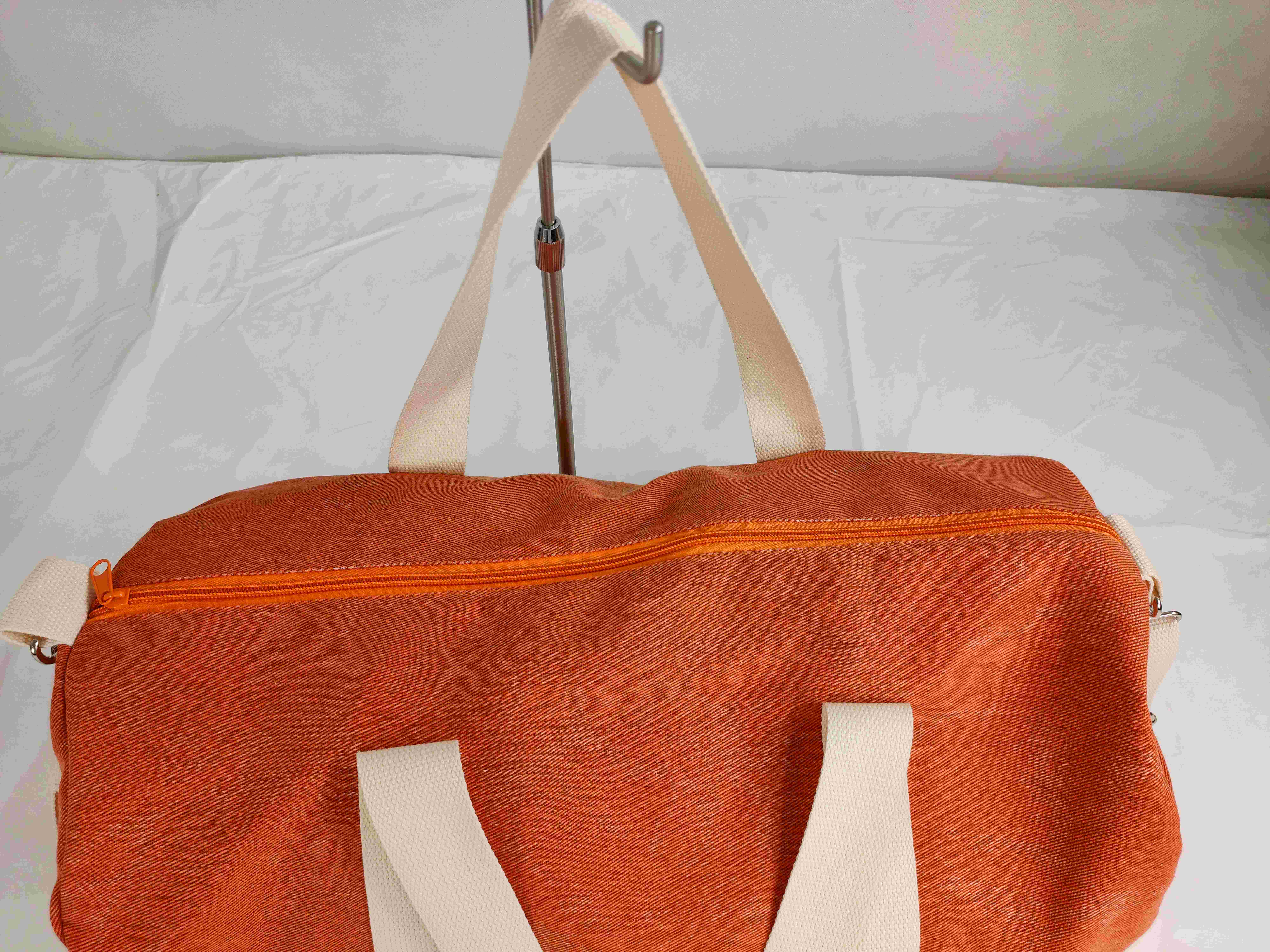 Hand-held crossbody bag