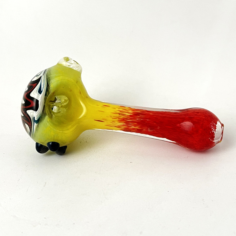 Red and yellow main color painted glass pipe;