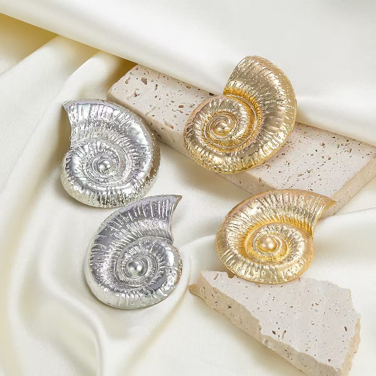 New cross-border spiral conch stainless steel beach high-end earrings from Europe and America
