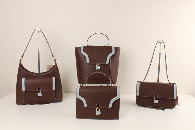 Blue Brown Classic Hardware Lock Collision Series Tote Bag Crossbody Shoulder Armpit Bag Mummy Bag