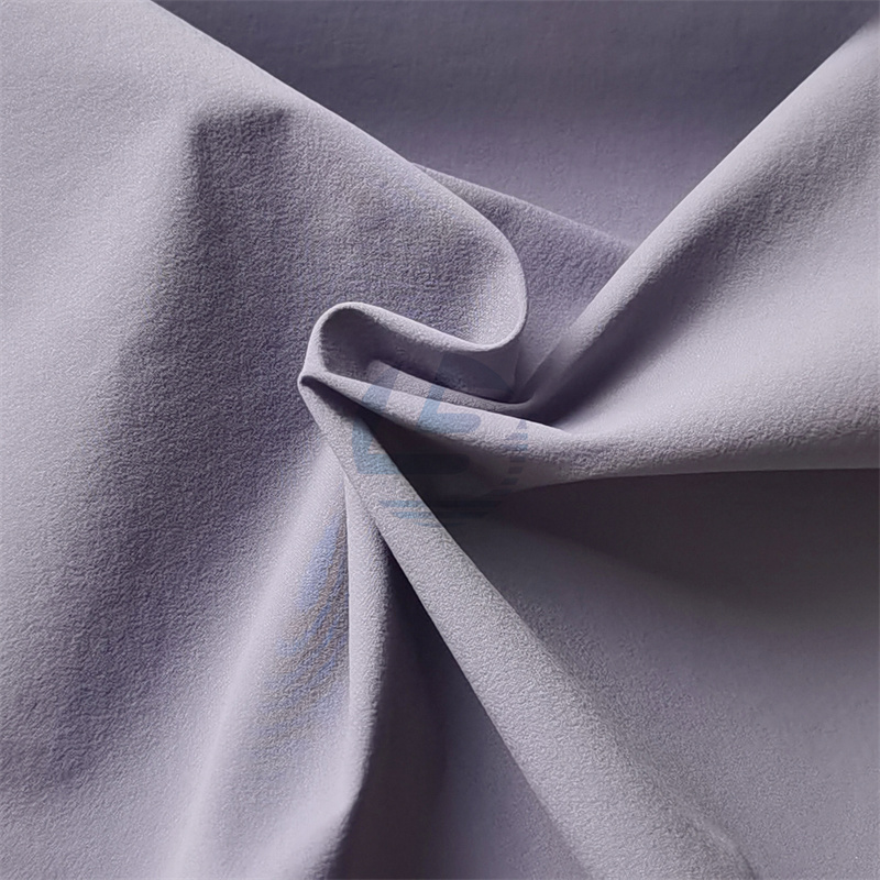 OBLSWN4258 Four ways nylon spandex fabric for skin coat UPF50+