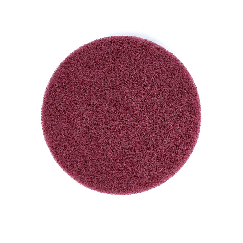 Self-adhesive scouring pad