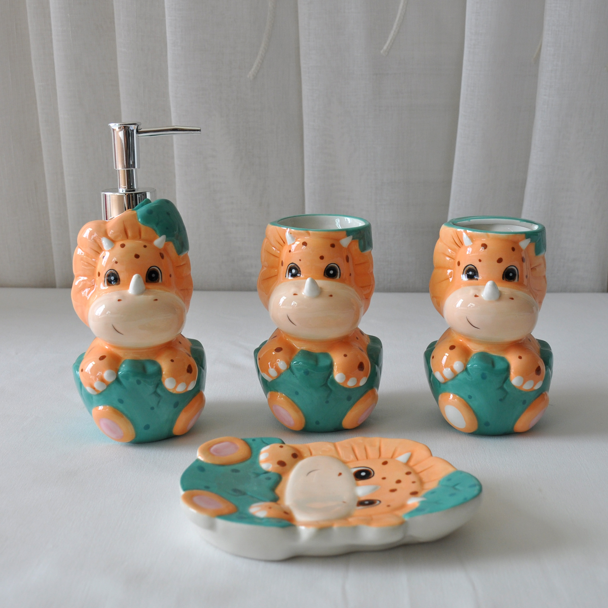 Four-piece hand-painted ceramic bathroom set
