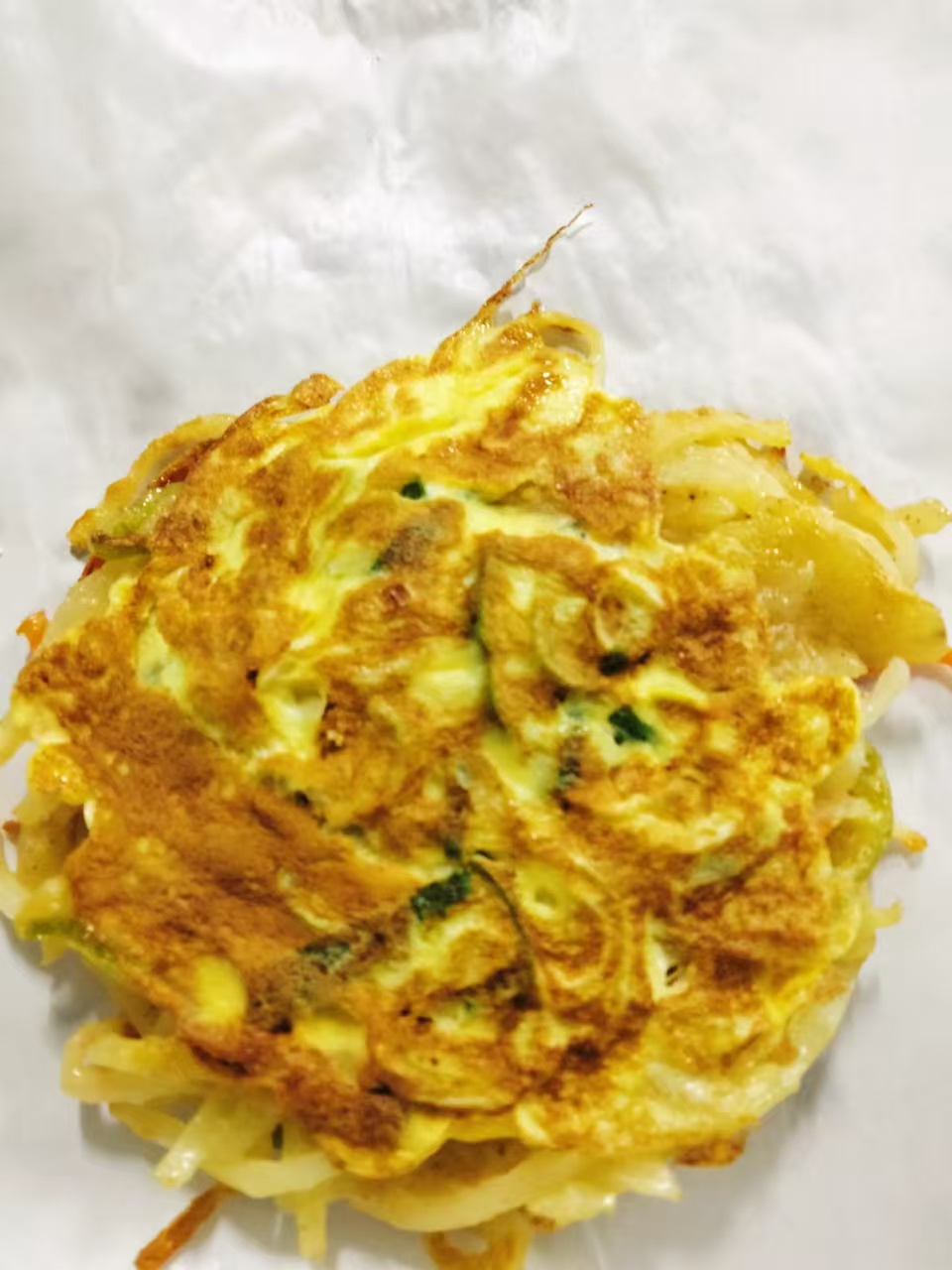 Frozen potato and egg cake