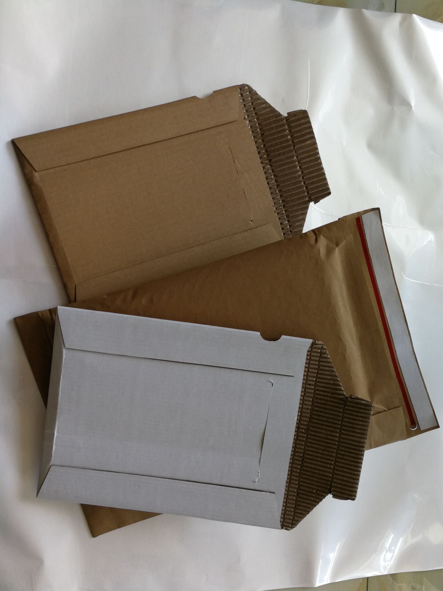 Reinforced kraft paper envelope
