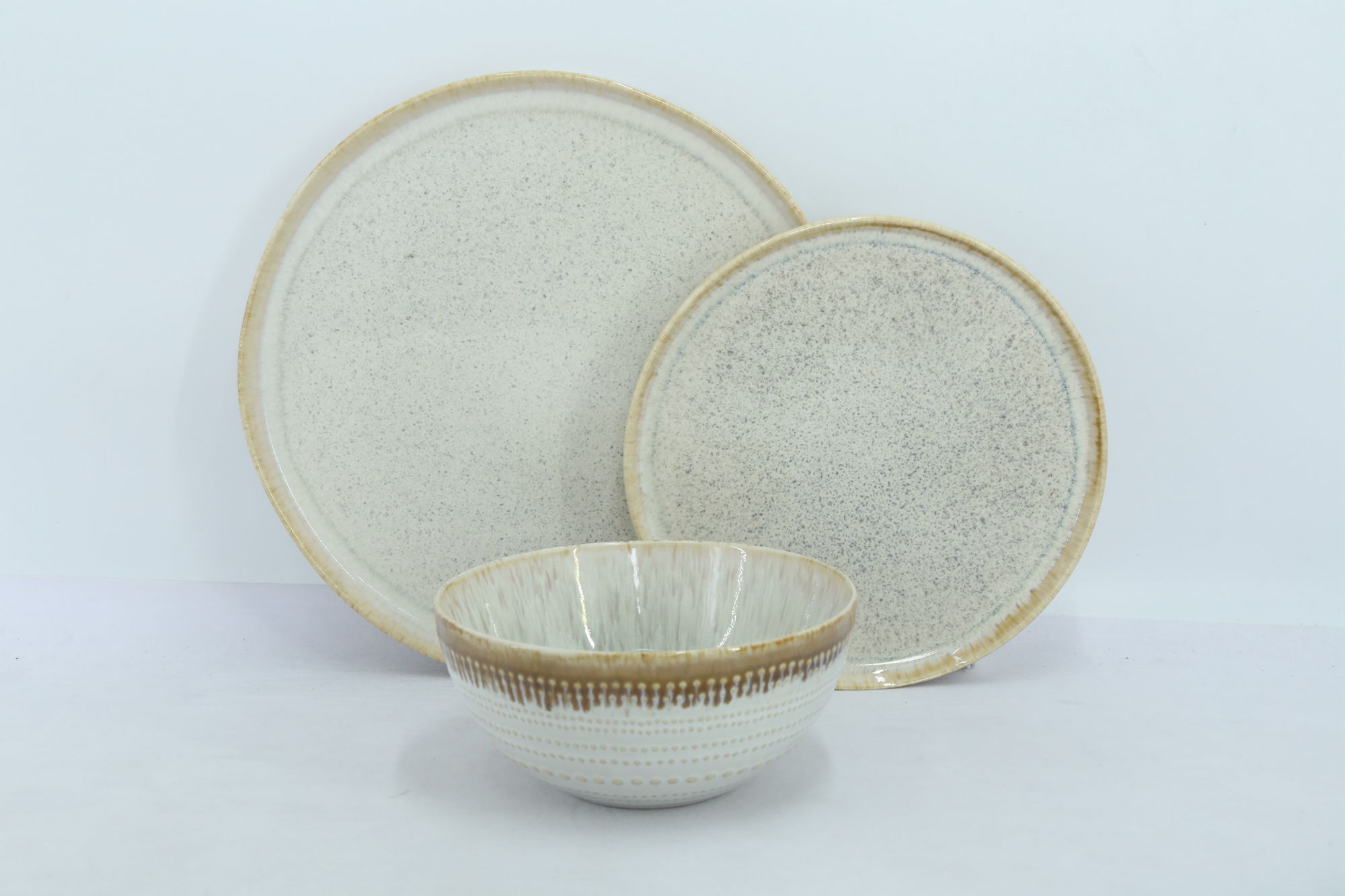 12-Piece Off-White Reactive Glaze Stoneware Dinner Set Plates and Bowls Nordic Style