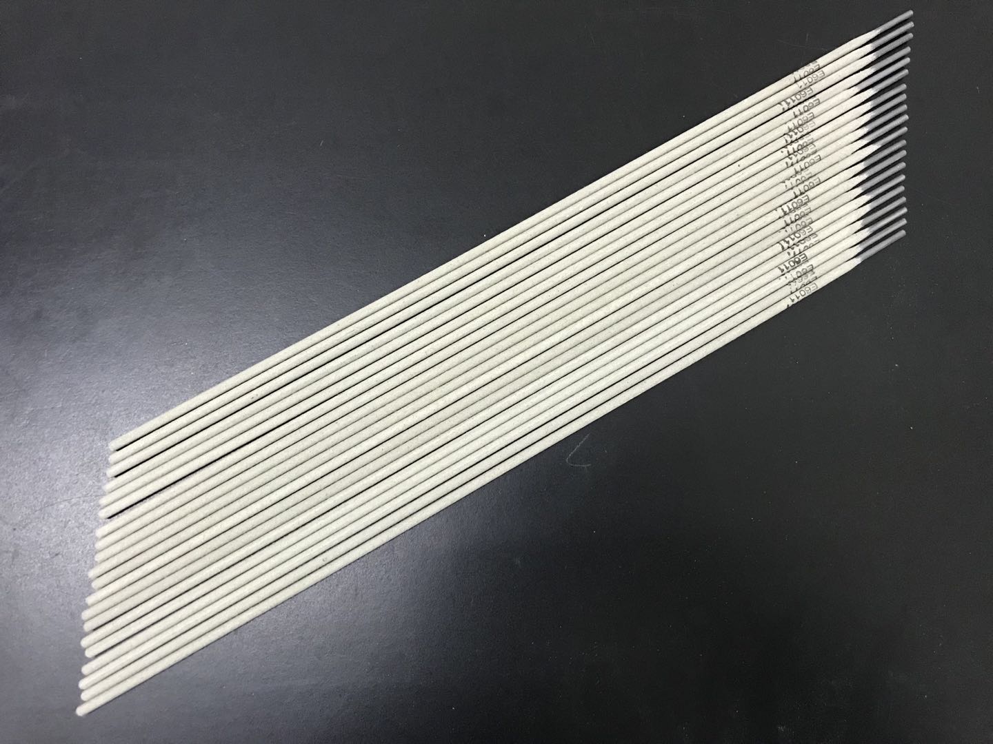 E6011