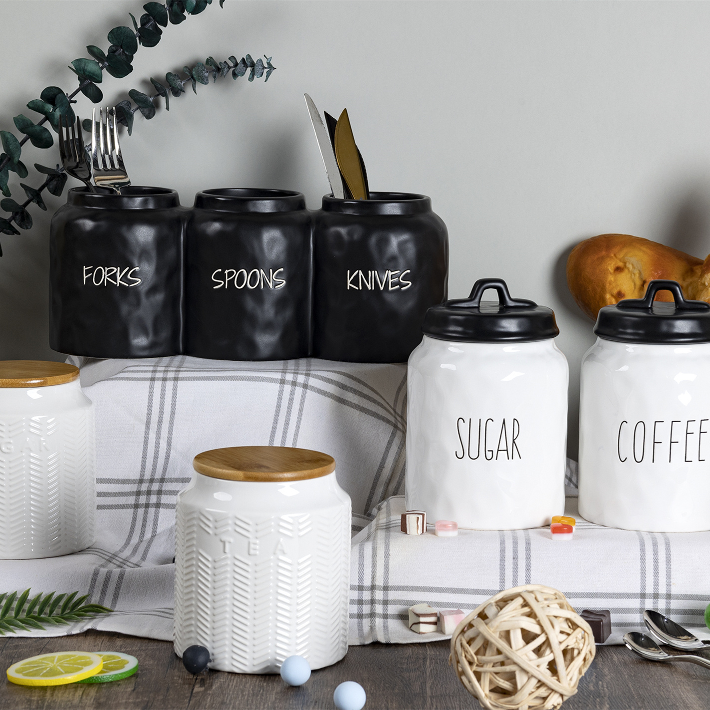 Ceramic storage jars with silkscreen text design available in multiple sizes and colors