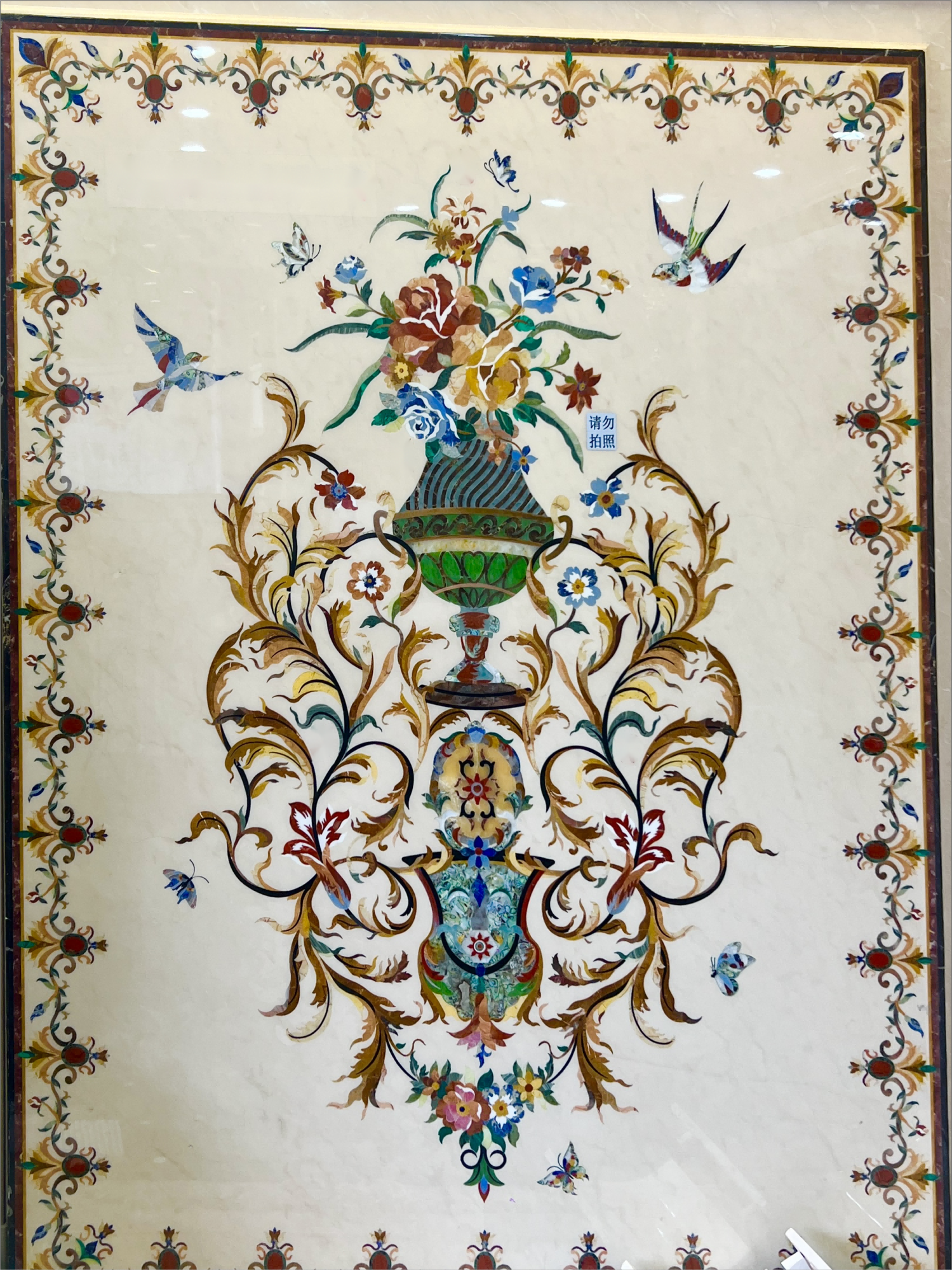 Handmade inlay and flower arrangement of natural gemstones