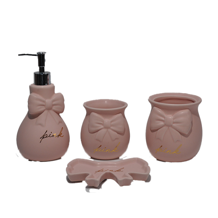 Bows embossed design - Pink bathroom set of four items