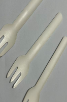 Disposable green paper fork
