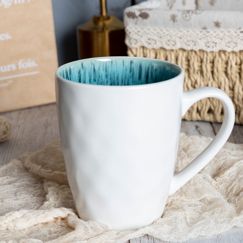 16.5OZ(470ML) Blue Reactive Glaze Mug with Black Speckles, White Textured Relief Exterior