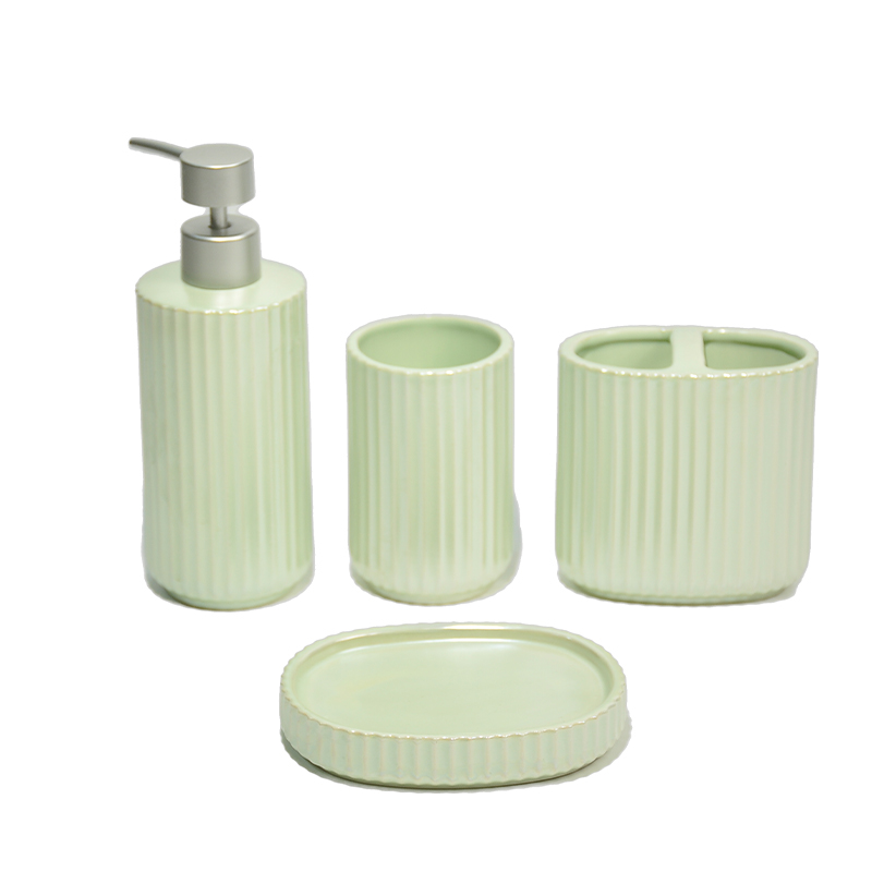 A light green vertical striped bathroom four-piece set
