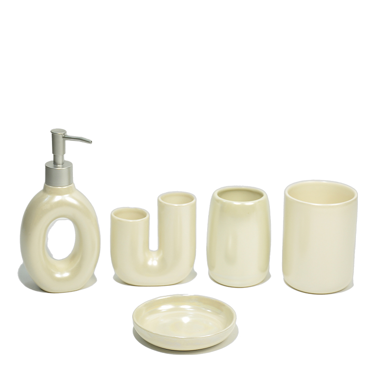 A simple and modern bathroom five-piece set in cream color