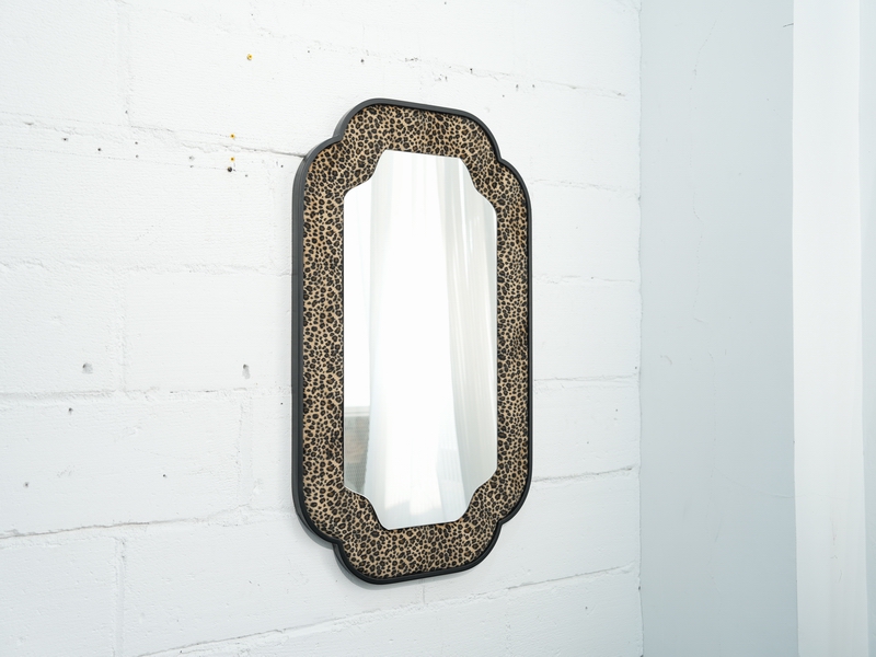 Leopard patterned metal wave edged rectangular wall mounted mirror