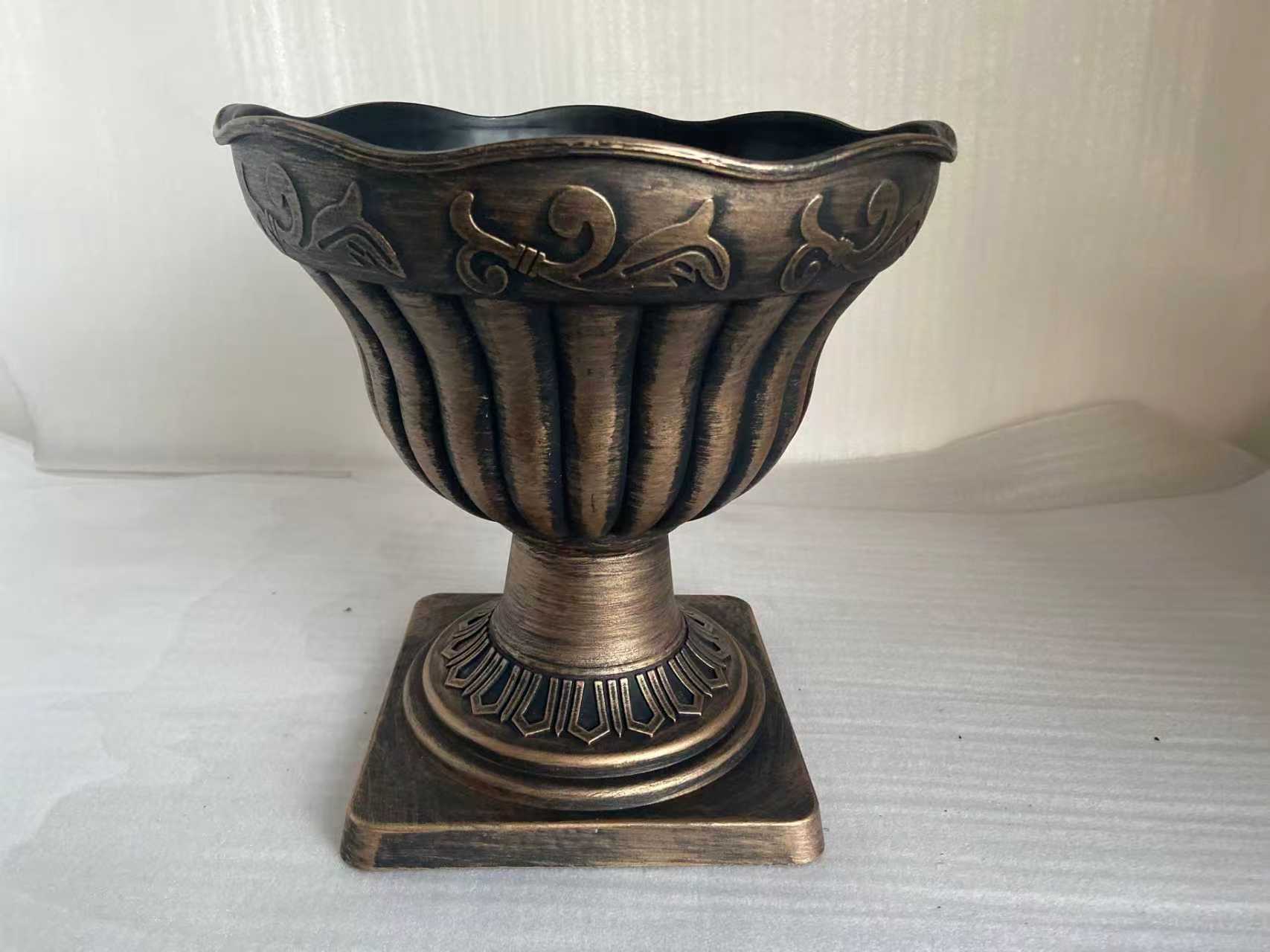 Plastic urn planter