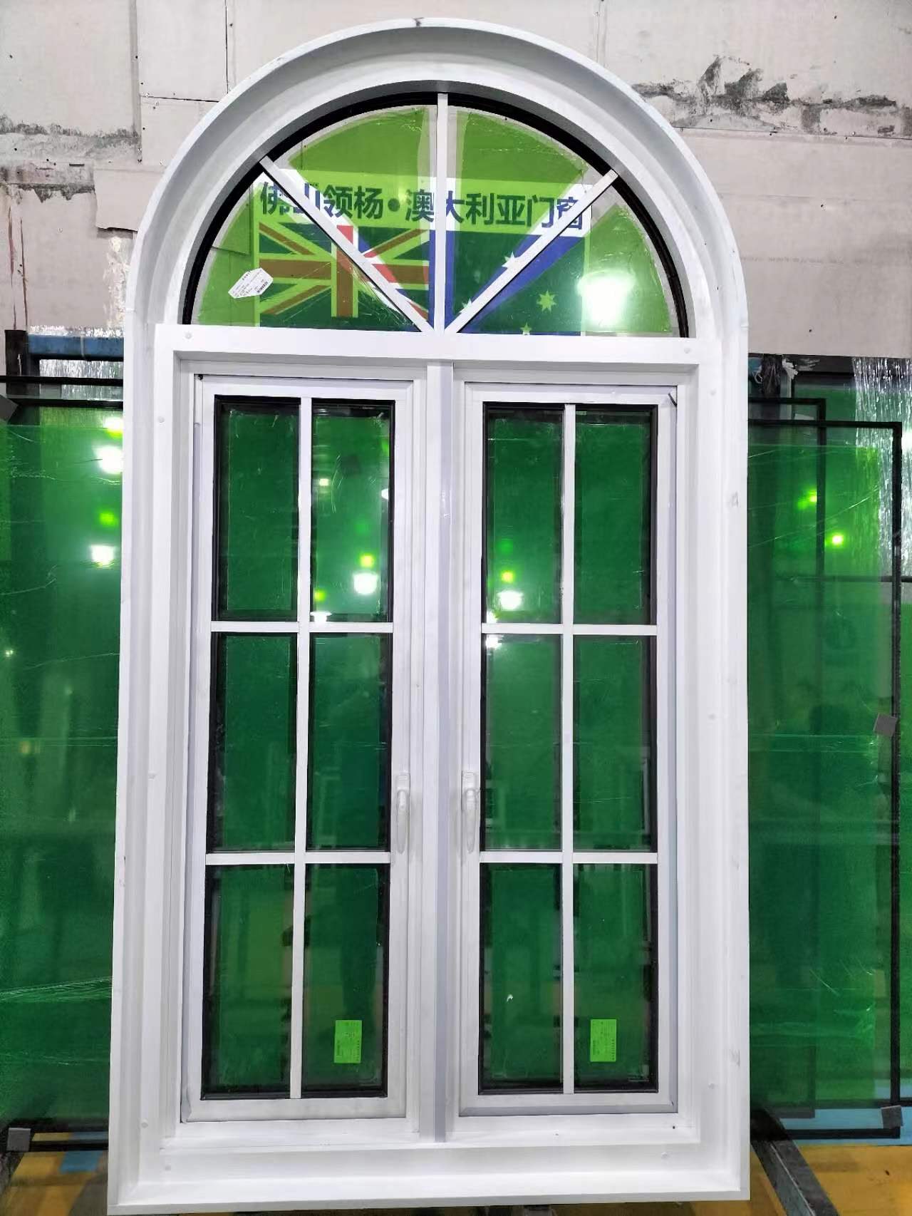 top arched windows with colonial bar