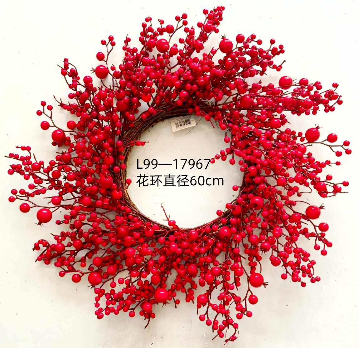 Decorative accessory featuring a red berry-themed garland