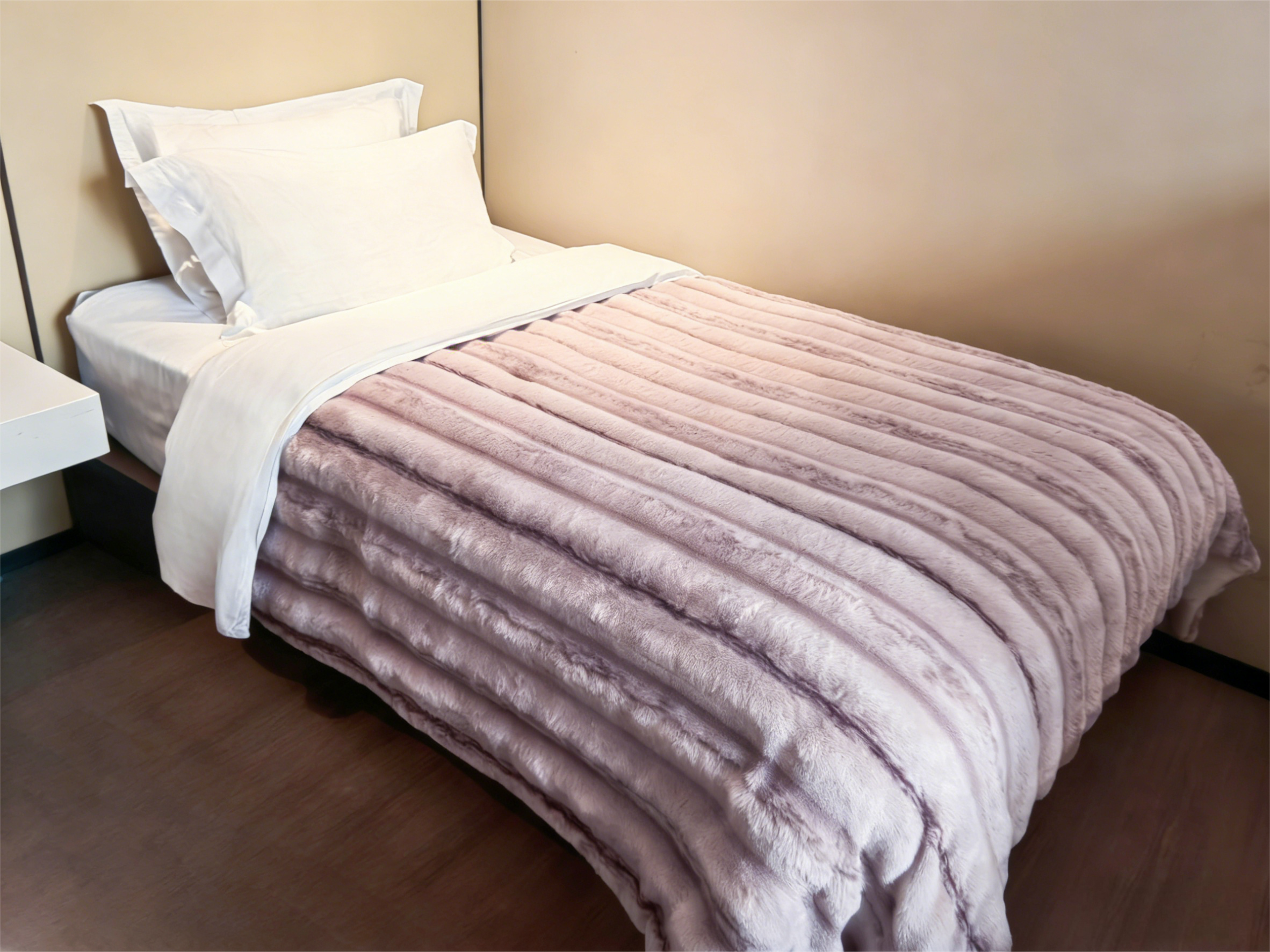 Printed faux rabbit fur comforter