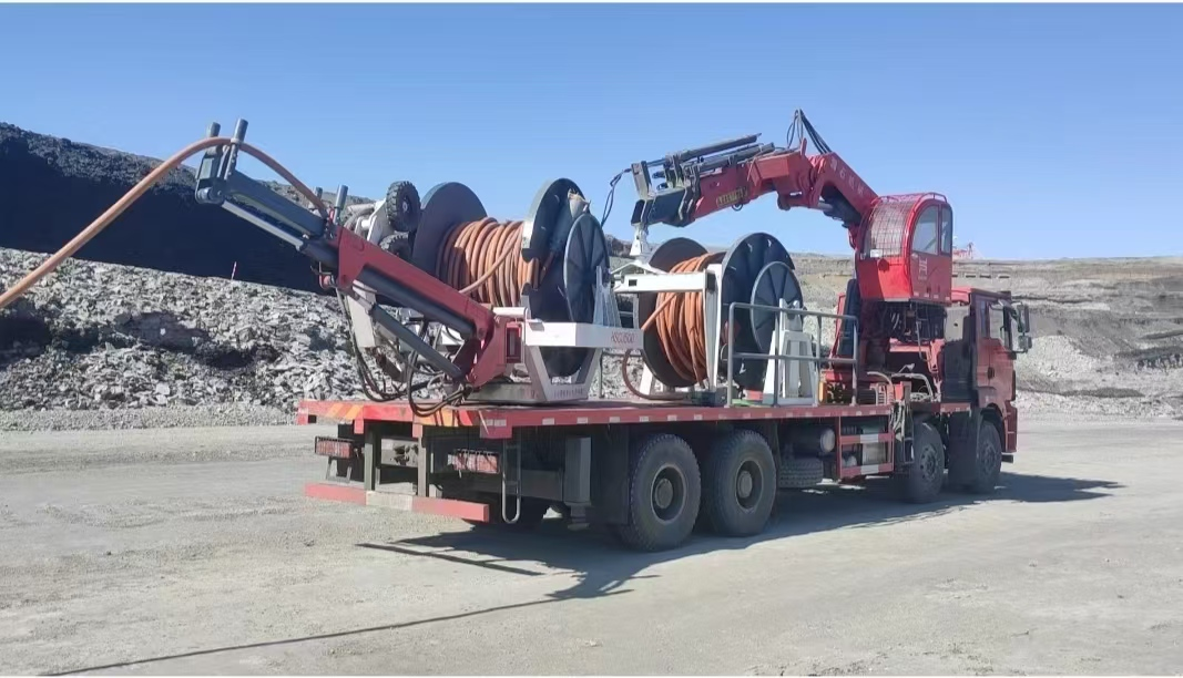 Cable laying vehicle