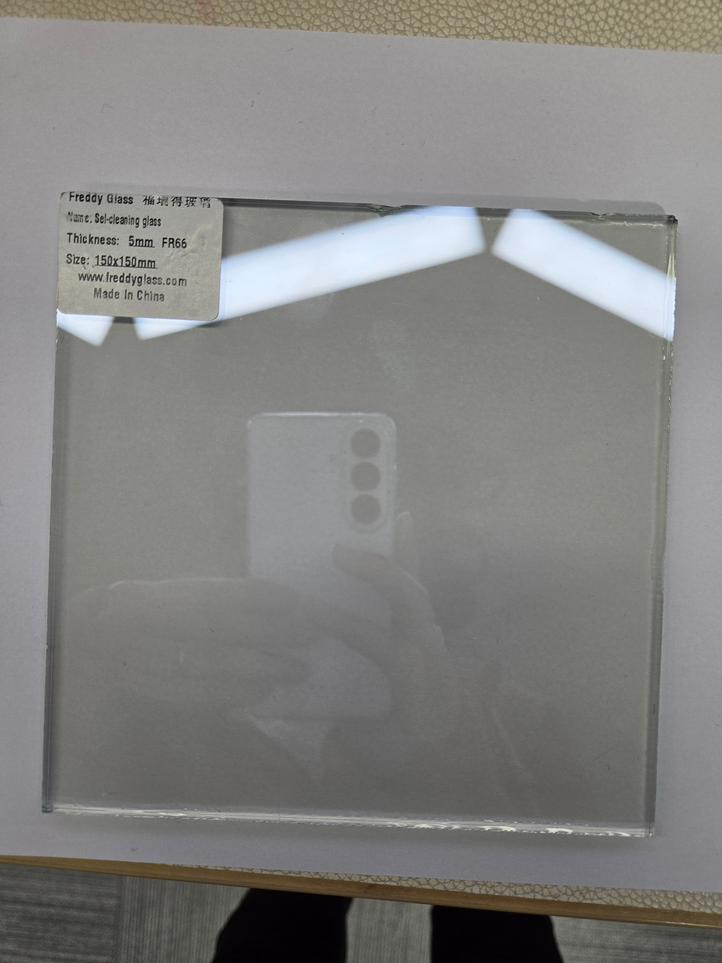 Self cleaning coated glass