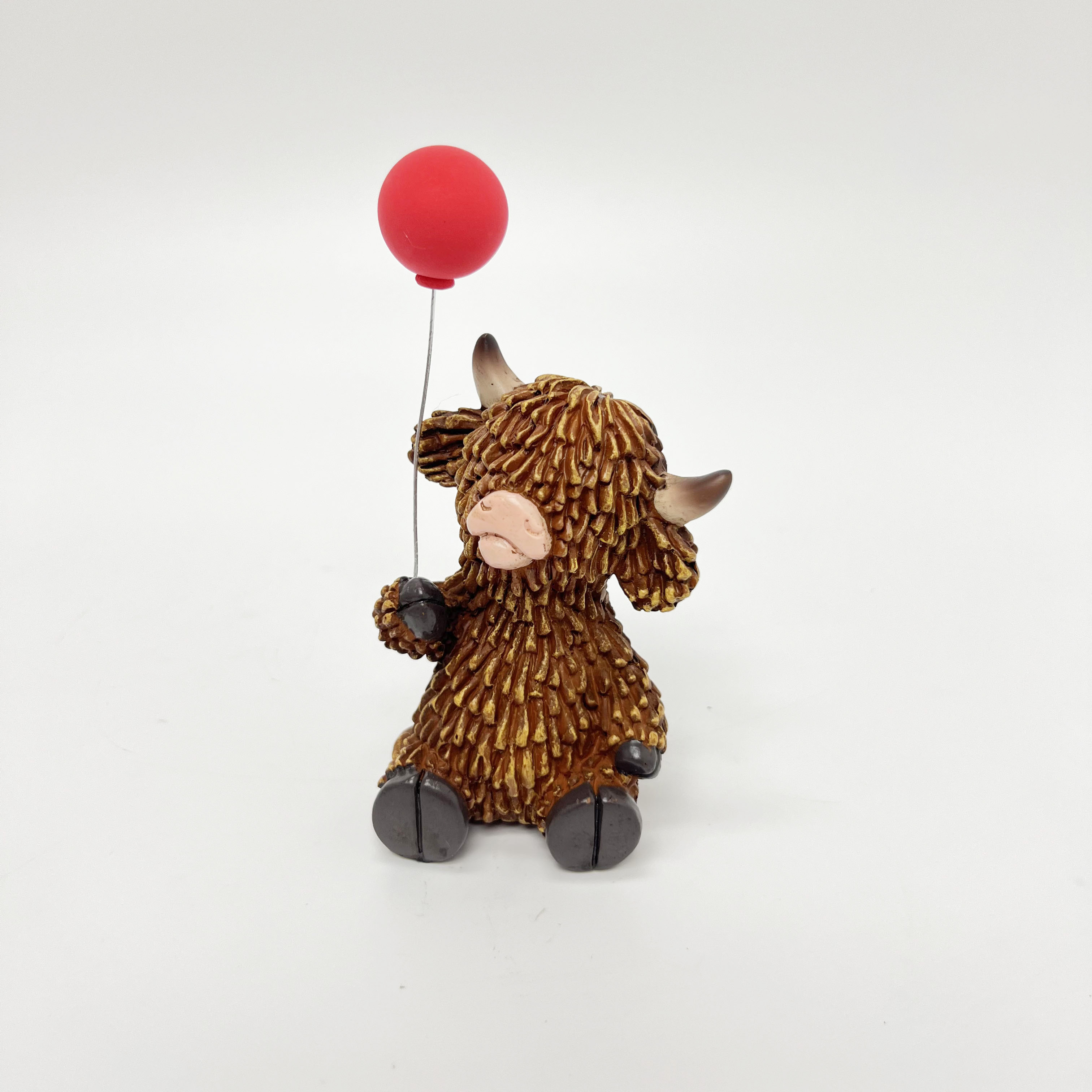 Highland Bull Holding Balloon Ornament