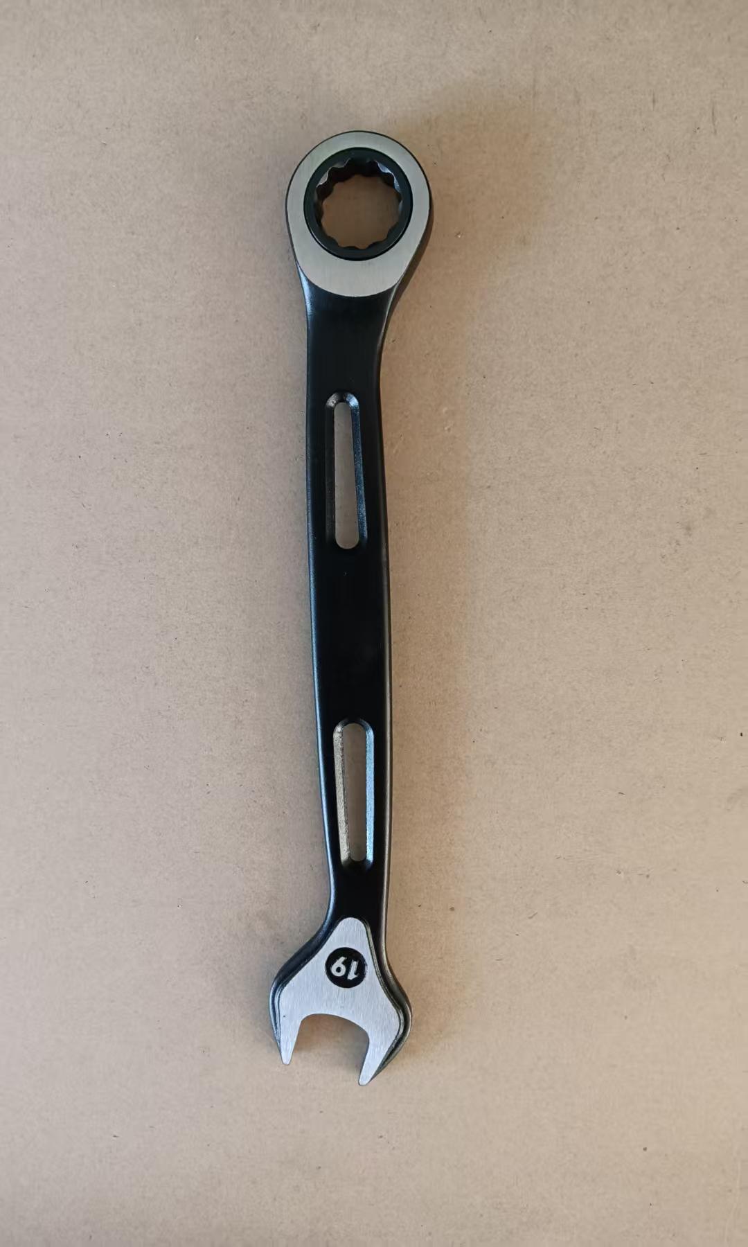 Double-Purpose Wrench With Open Ratchet AtAn Angle