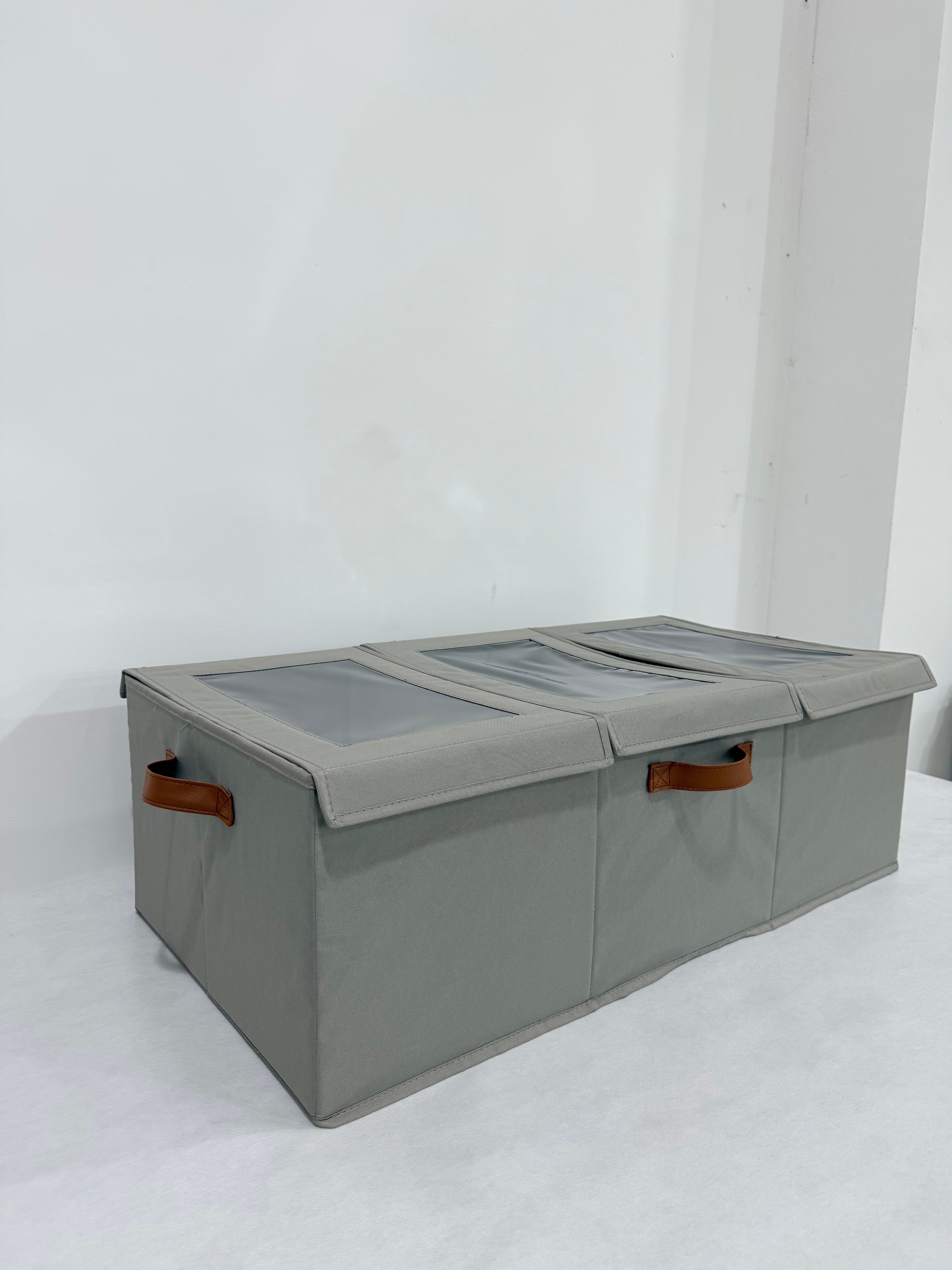 Three-compartment storage box with lid