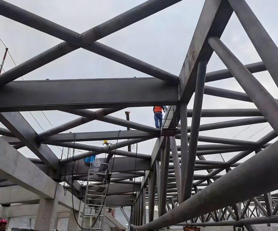Steel Truss Roof-Bearing Structural System for Warehouse Buildings